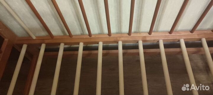 Детская кроватка с маятником