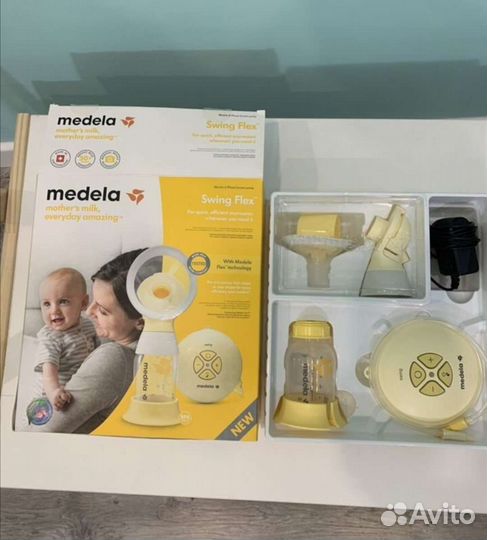 Молокоотсос medela swing flex электрический
