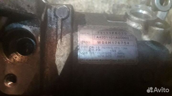 Компрессор кондиционера Subaru Impreza 73111FE030