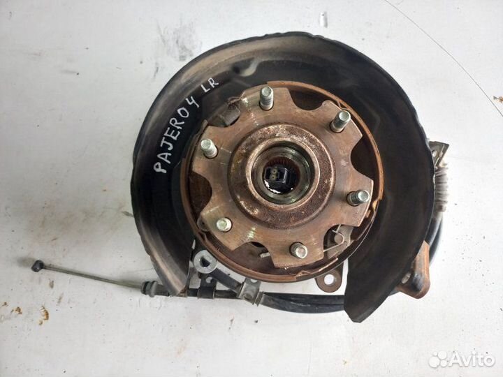 Кулак поворотный задний левый Mitsubishi Pajero