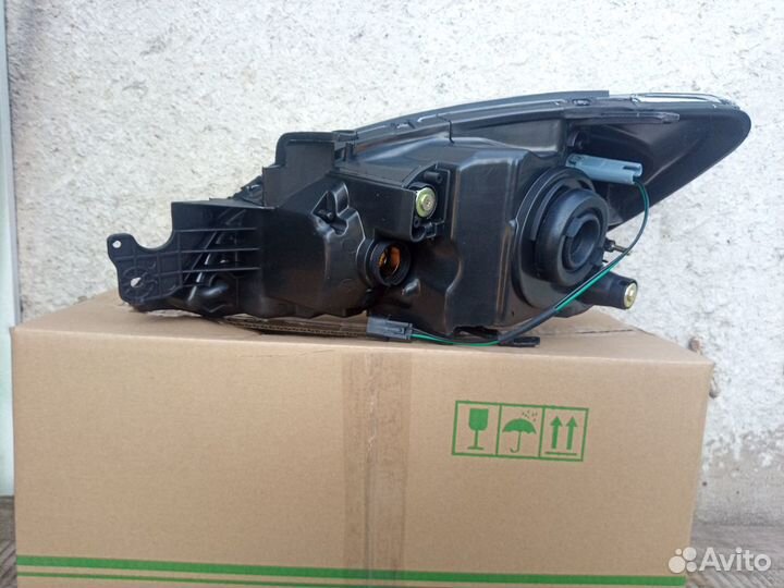 Фара Mitsubishi Lancer 04-07 (IX)