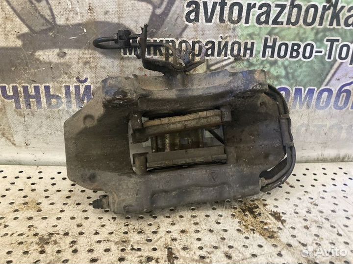 Суппорт тормозной задний левый Audi Q7