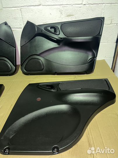 Обшива двери Лада Шеви Нива,Тревел Оригинал