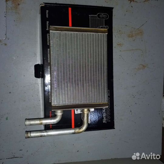 Радиатор печки Митсубиси Лансер 9