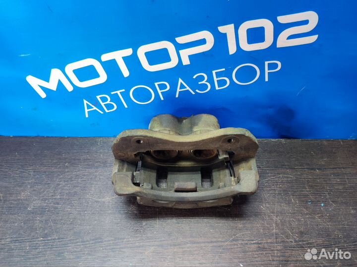 Суппорт передний правый SsangYong Rexton 1