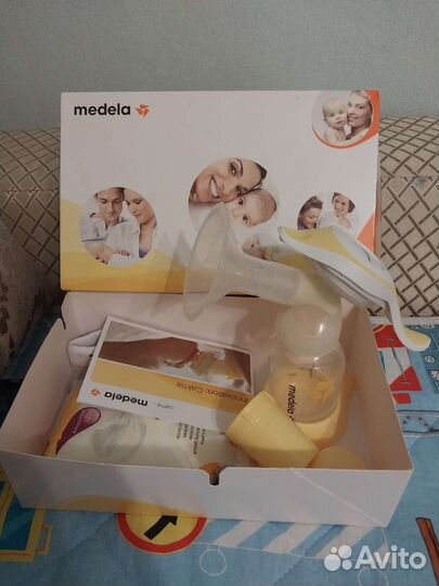 Молокоотсос medela ручной