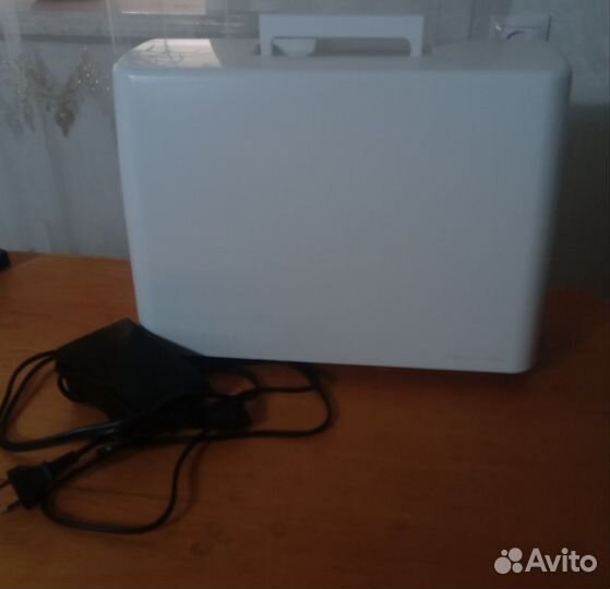 Швейная машина Janome Smart 2119