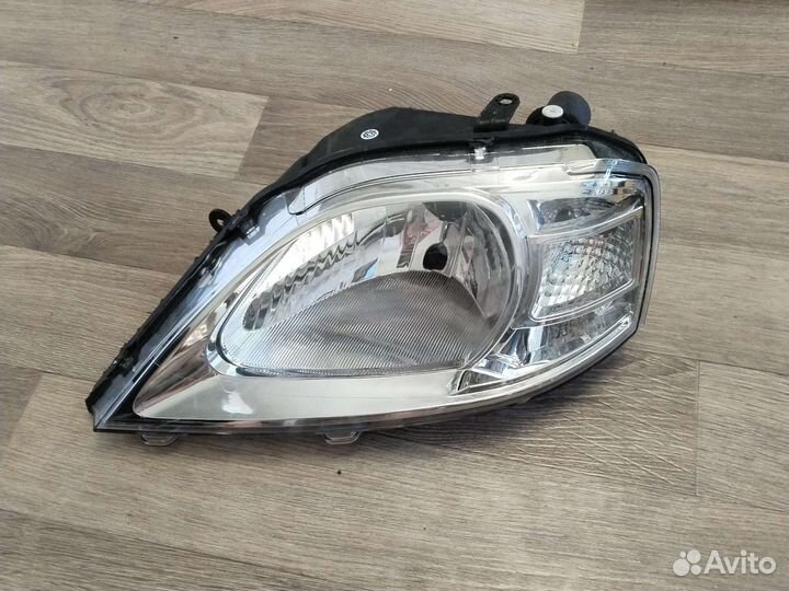 Фара левая Renault Logan 1 2004-2014