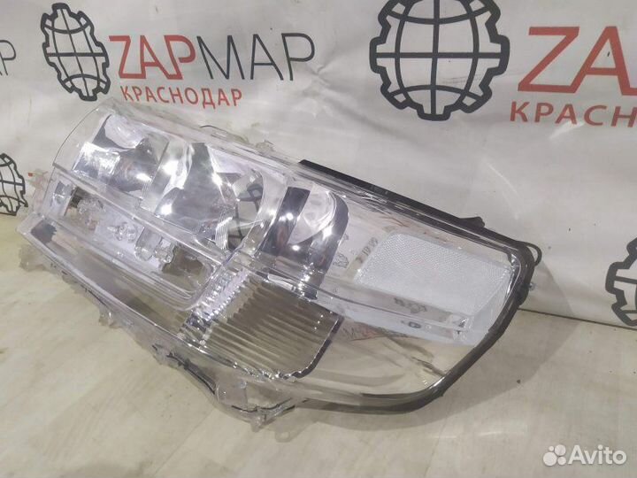 Стекло фары левое Toyota Land Cruiser J200