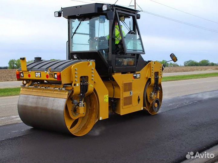 Машинист катка