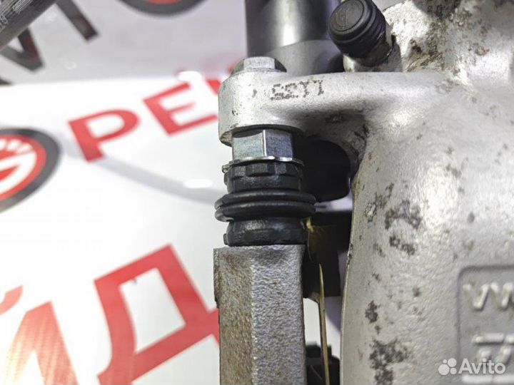 Суппорт тормозной задний правый Volkswagen Passat