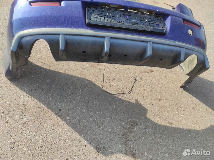 Бампер задний с диффузором mitsubishi lancer 10