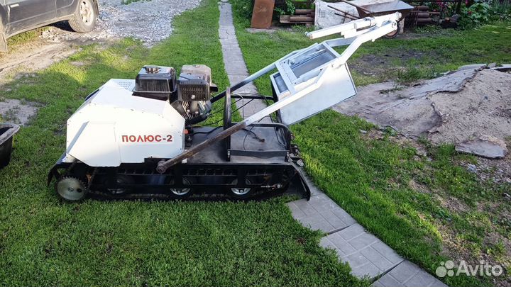 Мото буксировщик