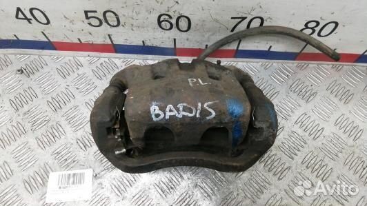 Суппорт тормозной передний левый nissan navara D40