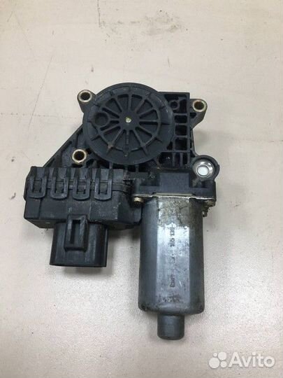 Моторчик стеклоподъемника Ford Focus