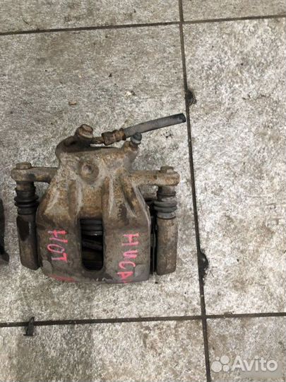 Передний суппорт Nissan Note E11