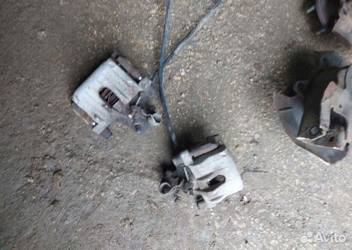 Суппорт задний Мазда 3 bl