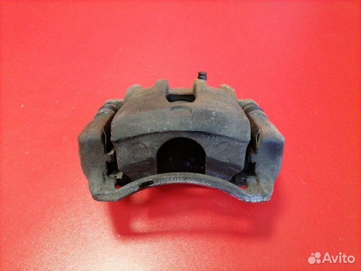 Суппорт передний левый Hyundai Solaris RB G4FA