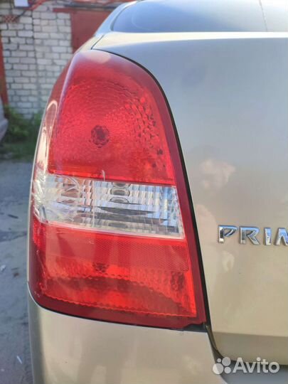 Фонарь задний левый nissan primera p12