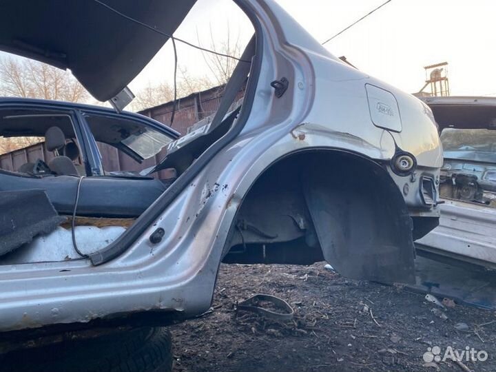 Крыло (четверть) заднее левое Kia Spectra