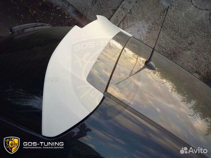 Тюнинг спойлер на Opel Astra J 5D