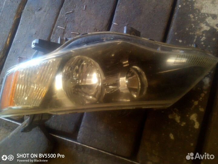 Фара левая Мицубиси outlander xl