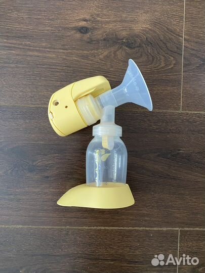 Молокоотсос medela электрический