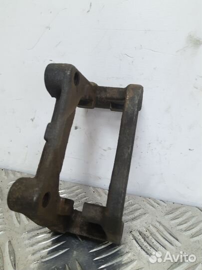 Б/У Скоба суппорта заднего LR Opel Astra Famil