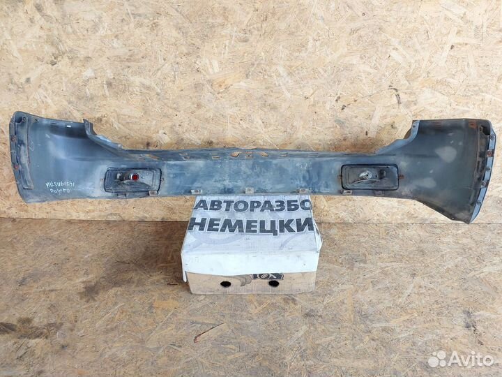 Бампер задний Mitsubishi Pajero Sport 1 до рест