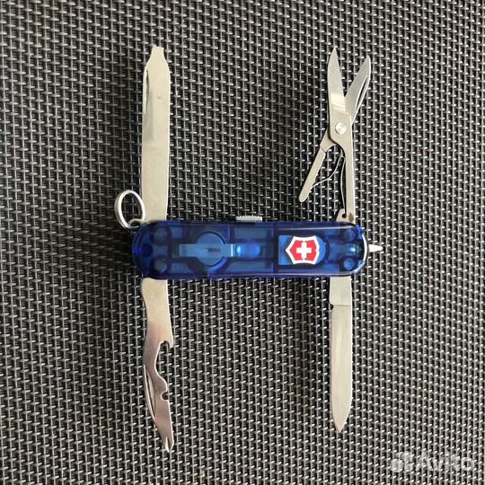 Карманный,нож от Victorinox С фонариком и ручкой