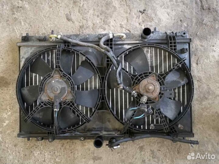 Вентилятор охлаждения на Лансер 9