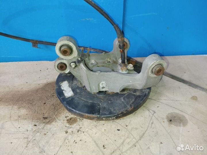 Кулак поворотный задний левый Nissan Teana L33