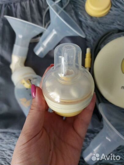Молокоотсос medela электрический