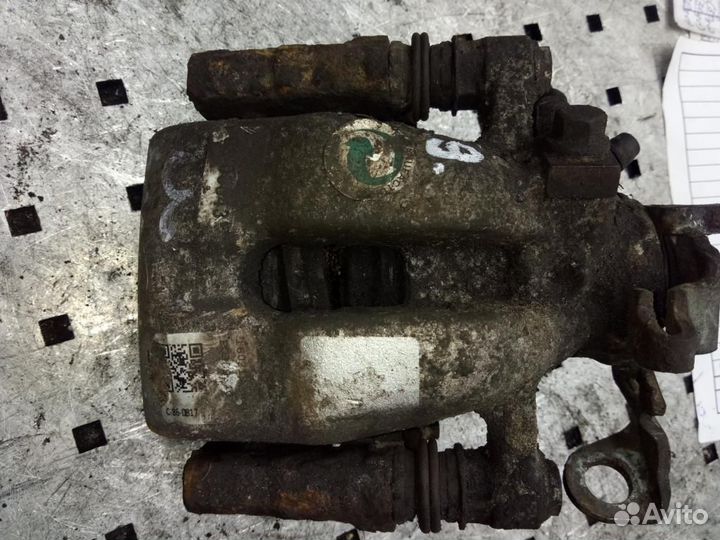 Суппорт задний левый Opel Meriva A