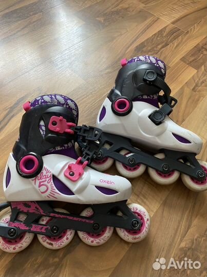 Роликовые коньки