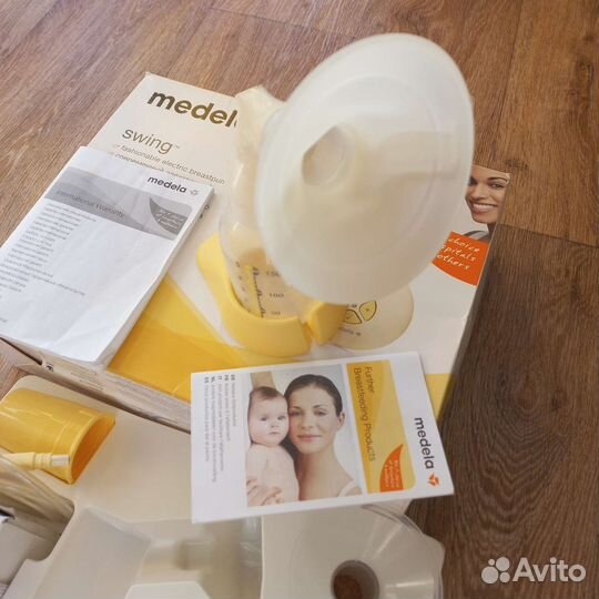 Молокоотсос medela электрический