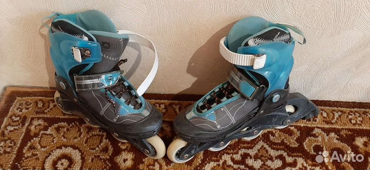 Роликовые коньки