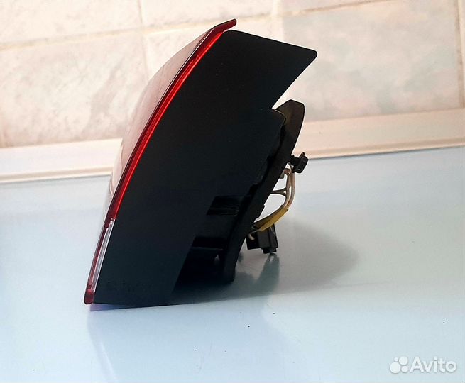 Задний внутренний фонарь багажника Opel Astra GTC