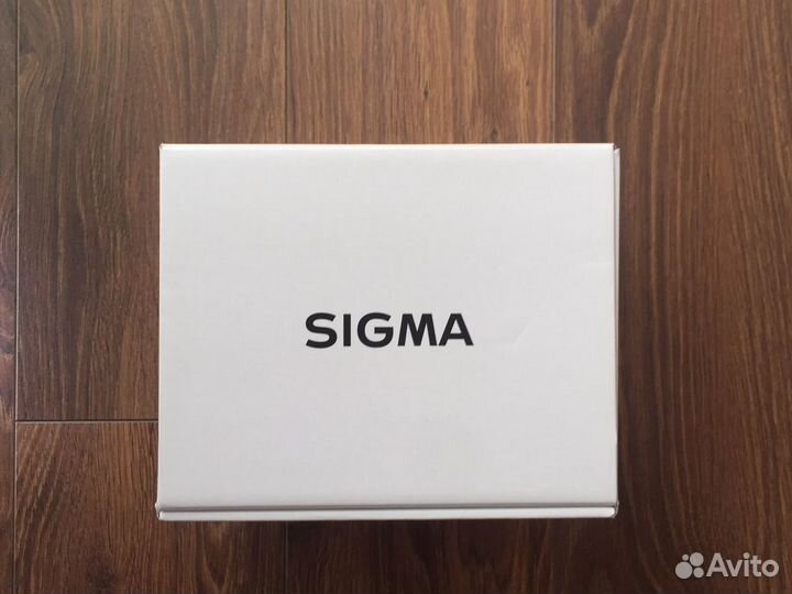 Sigma AF 135mm f/1.8 DG HSM ART Новые-Гарантия