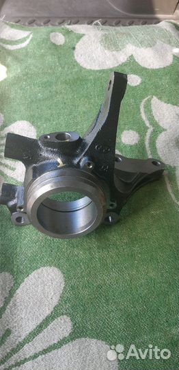 Поворотный кулак(Цапфа).Кia Sportage. Tucson.05-09