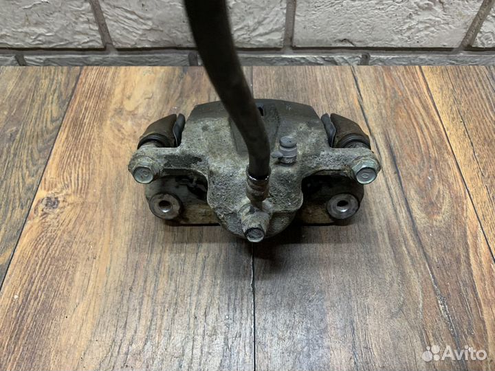 Kia Mohave Суппорт тормозной задний LH RH