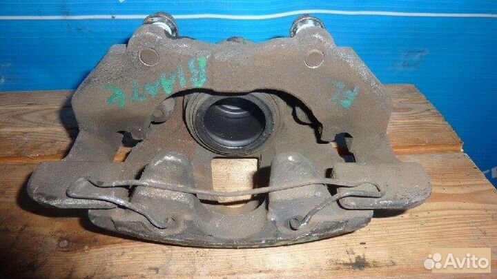 Суппорт передний левый Mazda Biante ccefw