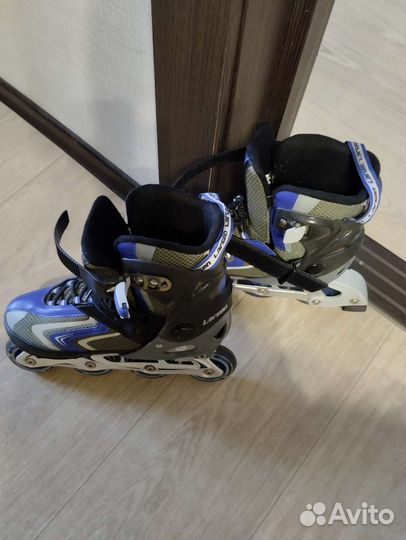 Роликовые коньки