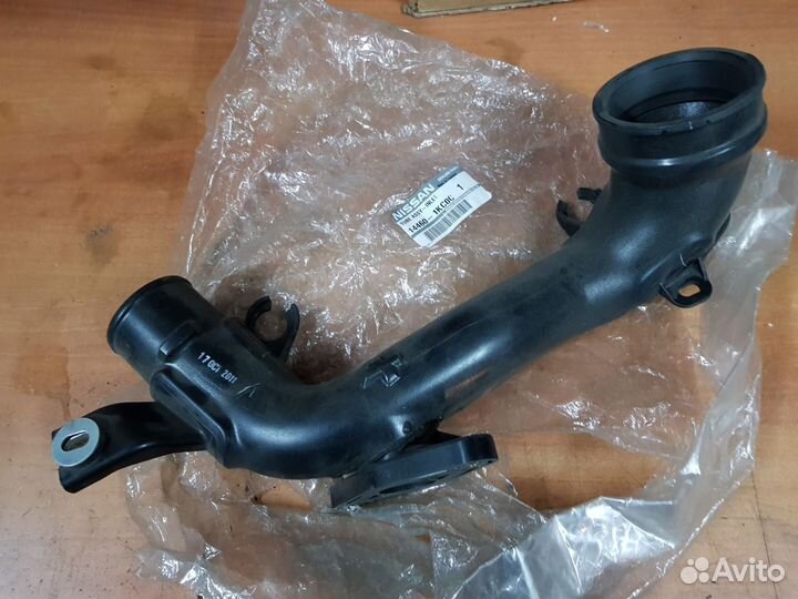 Патрубок радиатора Ниссан Жук F15 144601KC0C