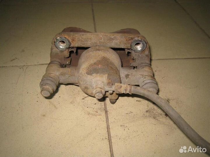 Суппорт тормозной передний левый KIA Picanto (BA)