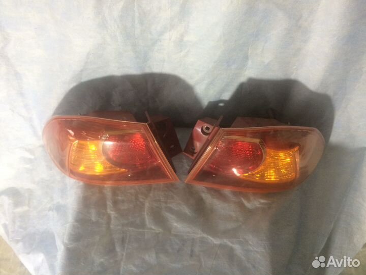 Фонарь задний левый внешний lancer X