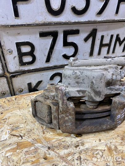 Суппорт тормозной Chevrolet Niva 2006