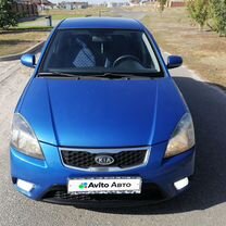 Kia Rio 1.4 AT, 2011, 244 000 км, с пробегом, цена 748 000 руб.