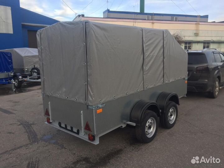 Двухосный бортовой прицеп
