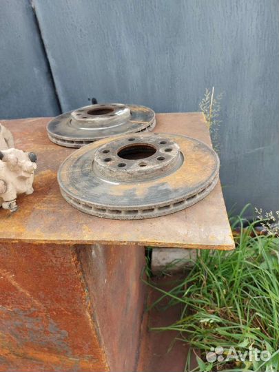 Суппорт передний L\R Opel Astra G Chevrolet Viva